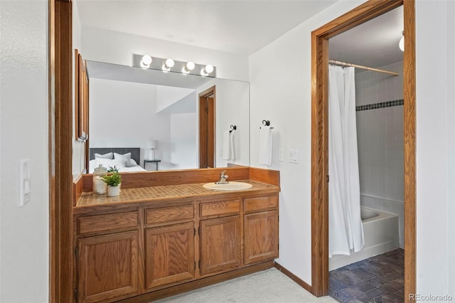 501 Manhattan Dr Unit 202, Boulder, CO 80303 - full bathroom with vanity, connected bathroom, and shower / tub combo with curtain