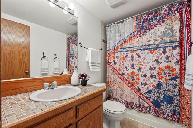 501 Manhattan Dr Unit 202, Boulder, CO 80303 - full bath with toilet, vanity, and tile patterned floors