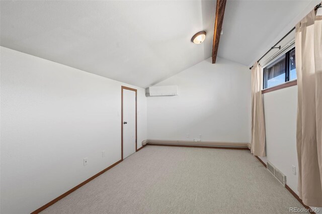 501 Manhattan Dr Unit 202, Boulder, CO 80303 - additional living space featuring baseboards, light carpet, and a wall mounted air conditioner