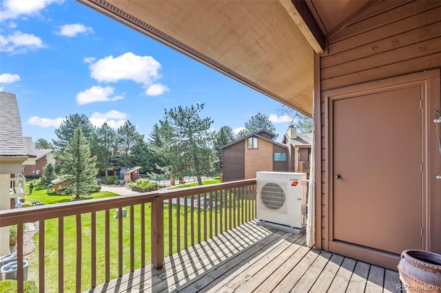 501 Manhattan Dr Unit 202, Boulder, CO 80303 - wooden deck featuring a lawn, central AC, a cooling unit, and a residential view