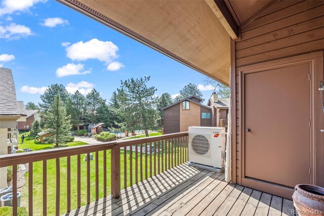 501 Manhattan Dr Unit 202, Boulder, CO 80303 - wooden deck featuring a lawn, central AC, a cooling unit, and a residential view