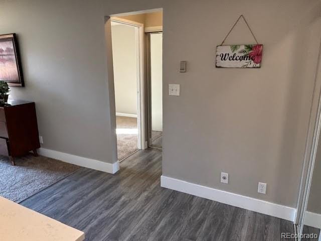 interior space with dark wood-type flooring