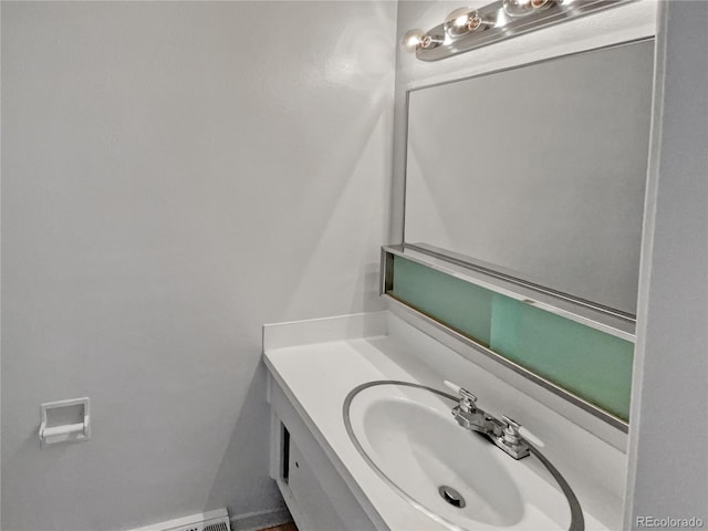 bathroom featuring large vanity