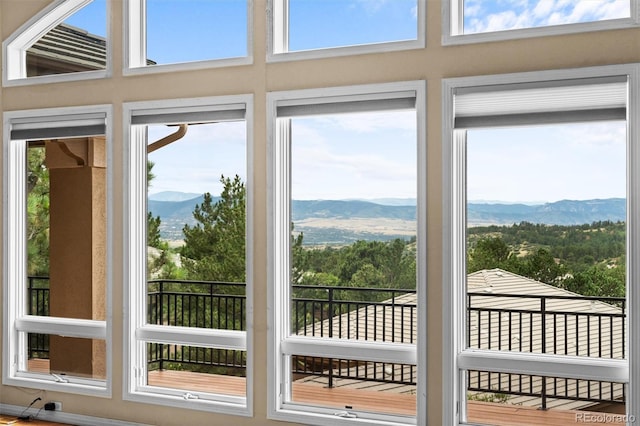 entryway with a mountain view and plenty of natural light