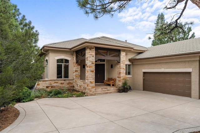 view of front of property with a garage