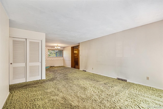 6019 Taft Ct, Arvada, CO 80004 - carpeted spare room featuring a chandelier and baseboards