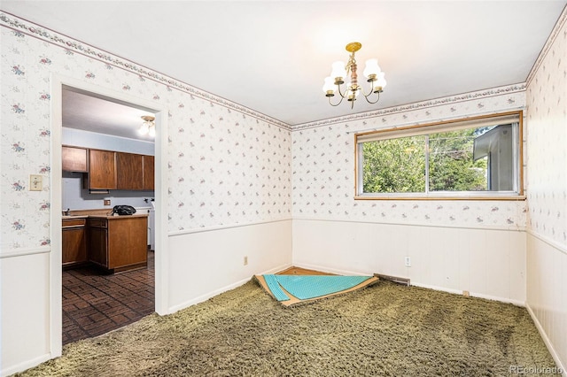 6019 Taft Ct, Arvada, CO 80004 - unfurnished room with wallpapered walls, a chandelier, and wainscoting