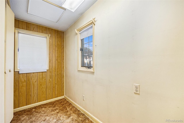 6019 Taft Ct, Arvada, CO 80004 - carpeted spare room with wood walls and attic access