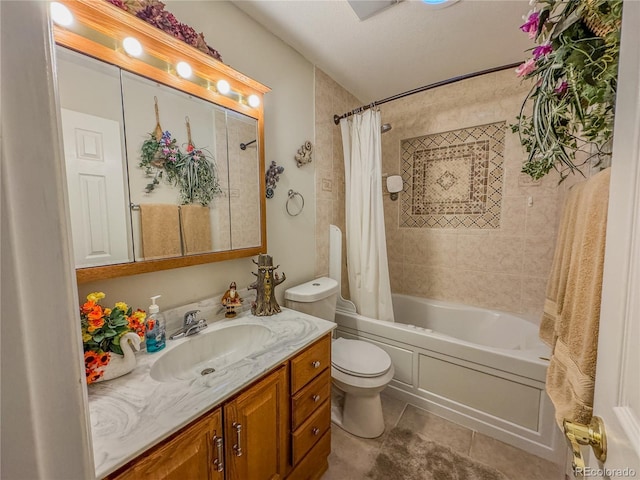 bathroom with tile patterned flooring, toilet, vanity, and shower / bath combo