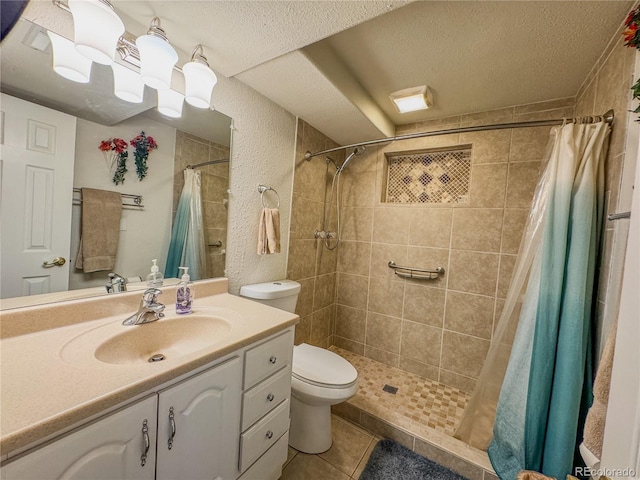 full bath featuring tile patterned flooring, toilet, a tile shower, and a textured ceiling