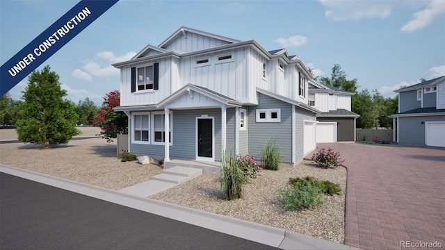 46549 Sunflower Ln, Bennett, CO 80102 - modern inspired farmhouse with board and batten siding, covered porch, decorative driveway, and an attached garage