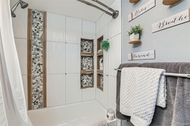 bathroom with shower / bath combo