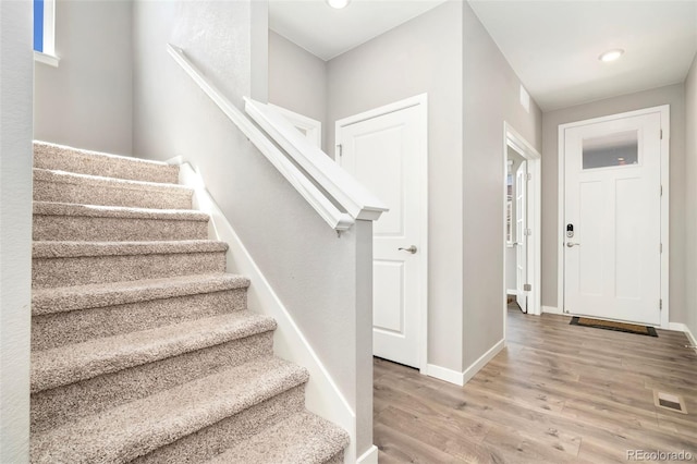 4209 Fox Grove Dr, Fort Collins, CO 80524 - stairway with wood finished floors, baseboards, and recessed lighting