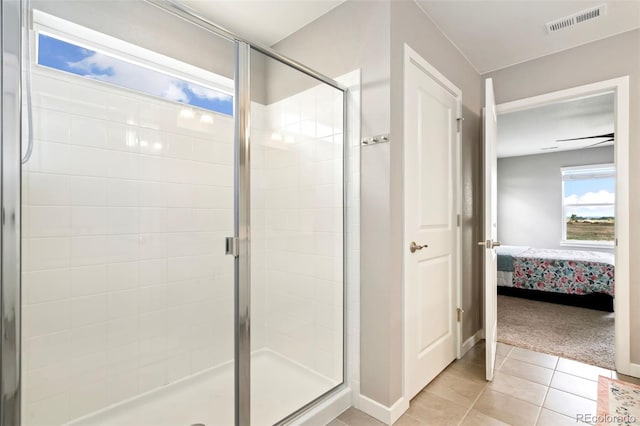 4209 Fox Grove Dr, Fort Collins, CO 80524 - ensuite bathroom featuring a shower stall, tile patterned flooring, and baseboards