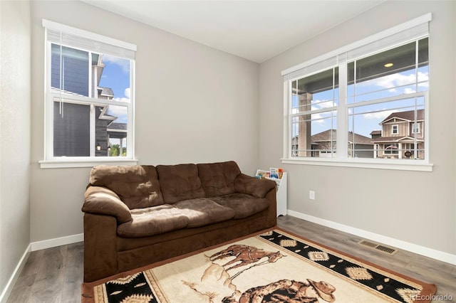 4209 Fox Grove Dr, Fort Collins, CO 80524 - living room featuring baseboards, plenty of natural light, and wood finished floors