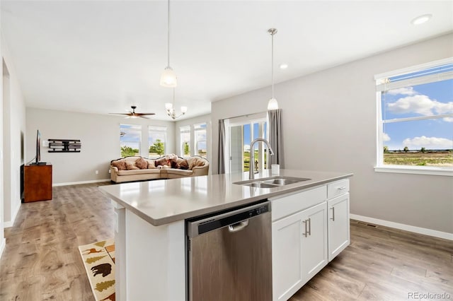 4209 Fox Grove Dr, Fort Collins, CO 80524 - kitchen featuring stainless steel dishwasher, a sink, a kitchen island with sink, baseboards, and recessed lighting