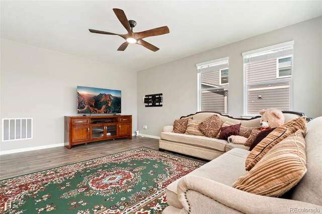 4209 Fox Grove Dr, Fort Collins, CO 80524 - living area featuring baseboards, wood finished floors, and ceiling fan