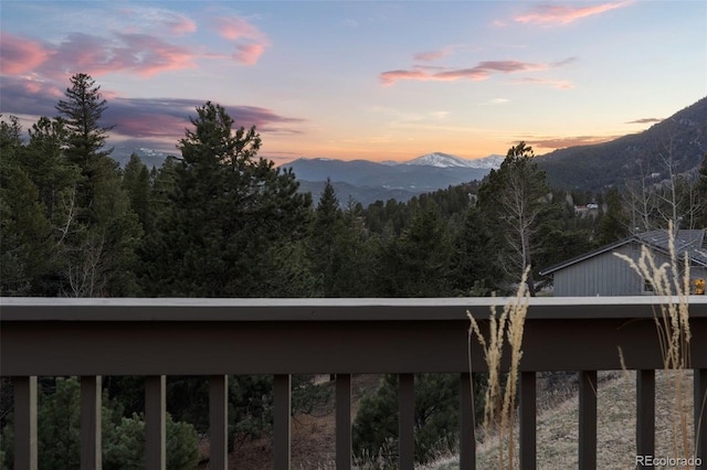 view of mountain feature featuring a view of trees