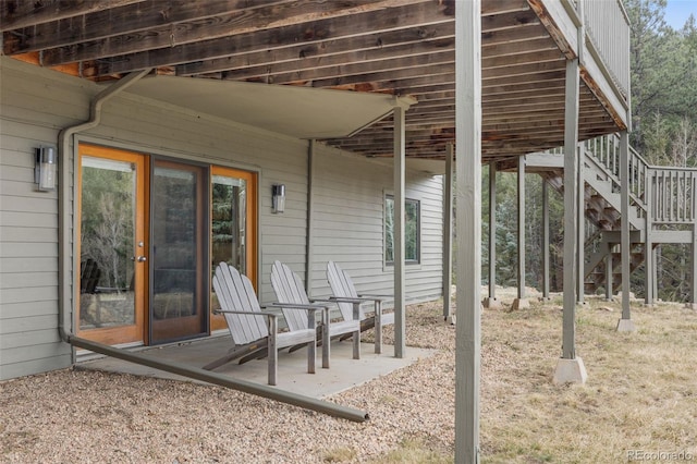 view of patio / terrace featuring stairs