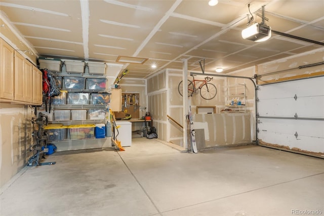 garage featuring a garage door opener