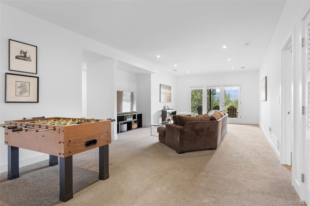 playroom with baseboards, light colored carpet, and recessed lighting