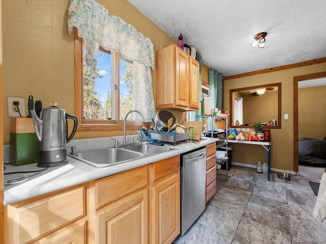 kitchen featuring a textured ceiling, stainless steel dishwasher, light brown cabinetry, ornamental molding, and sink