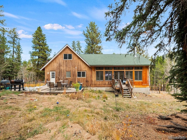 rear view of property with a patio area