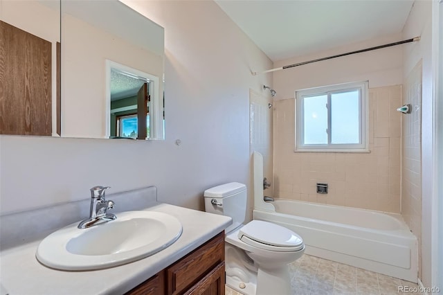 bathroom with toilet, shower / washtub combination, and vanity