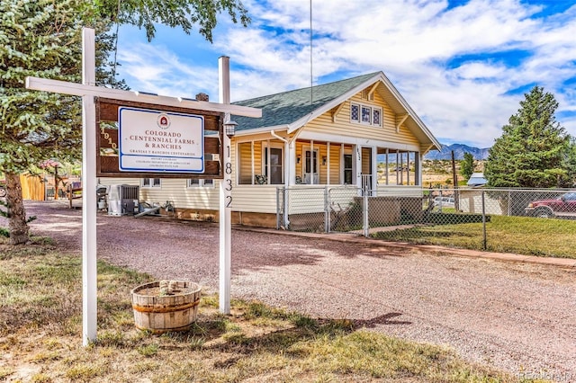 exterior space featuring a mountain view and covered porch