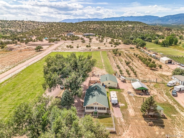 bird's eye view with a mountain view and a rural view