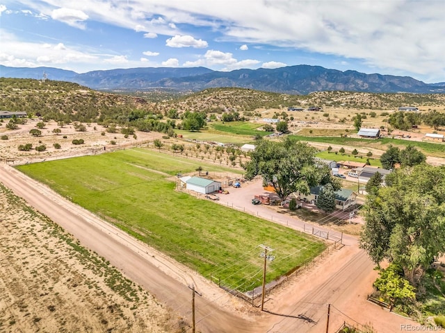 drone / aerial view featuring a mountain view