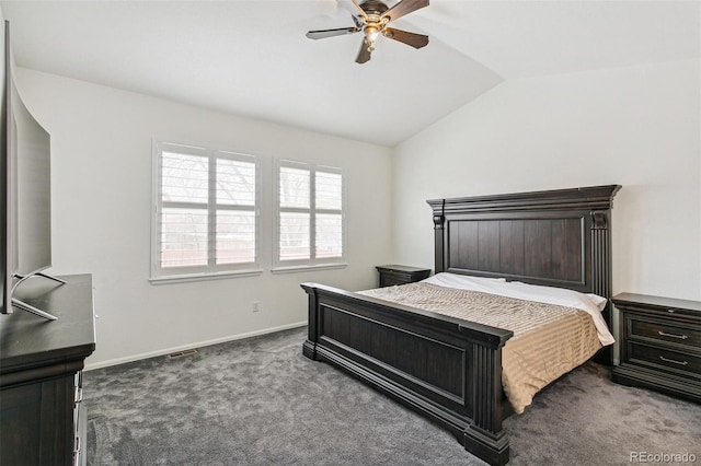 carpeted bedroom with ceiling fan and lofted ceiling