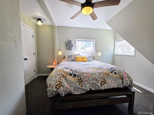 313 W Arkansas St, Buena Vista, CO 81211 - bedroom with dark carpet, ceiling fan, and baseboards