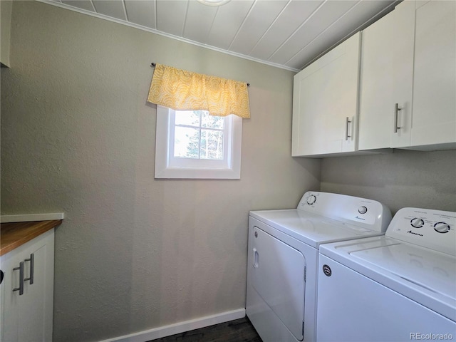 313 W Arkansas St, Buena Vista, CO 81211 - laundry area with washer and clothes dryer, dark wood finished floors, baseboards, cabinet space, and ornamental molding