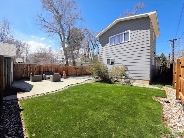 313 W Arkansas St, Buena Vista, CO 81211 - view of yard featuring a fenced backyard and a patio area