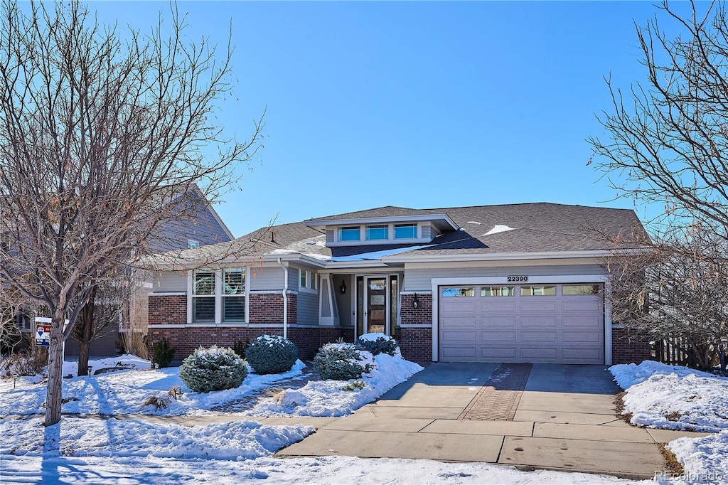 prairie-style home with a garage