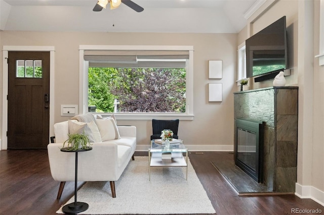 815 S Gaylord St, Denver, CO 80209 - living room with dark wood finished floors, a glass covered fireplace, ceiling fan, and lofted ceiling