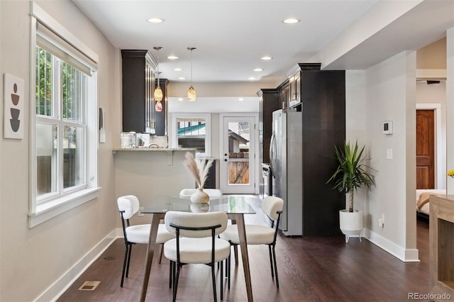 815 S Gaylord St, Denver, CO 80209 - dining area with dark wood-type flooring and recessed lighting