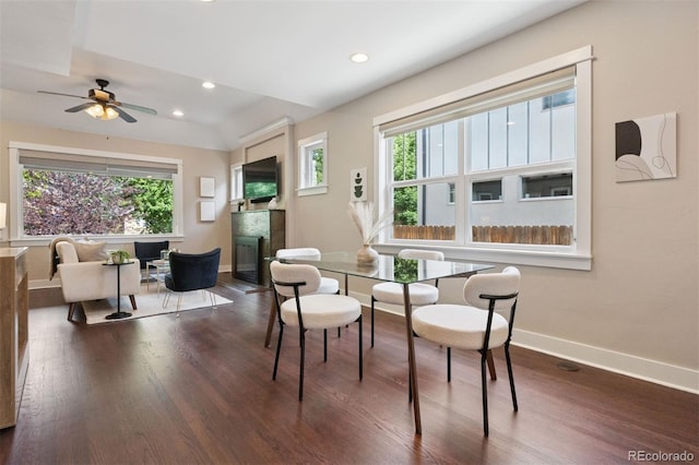 815 S Gaylord St, Denver, CO 80209 - dining space featuring plenty of natural light, dark wood-type flooring, a glass covered fireplace, and recessed lighting