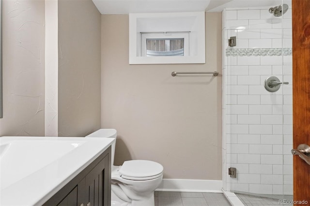 815 S Gaylord St, Denver, CO 80209 - full bath with a tile shower, vanity, and tile patterned flooring