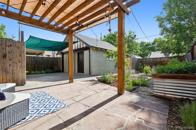 815 S Gaylord St, Denver, CO 80209 - fenced backyard featuring a pergola, a patio, and an outdoor structure