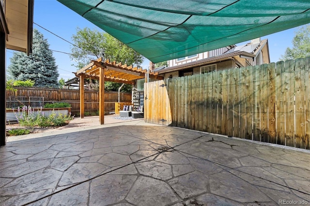 815 S Gaylord St, Denver, CO 80209 - fenced backyard featuring a pergola and a patio