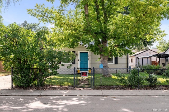5465 Saulsbury Ct, Arvada, CO 80002 - view of property hidden behind natural elements with a fenced front yard and a gate
