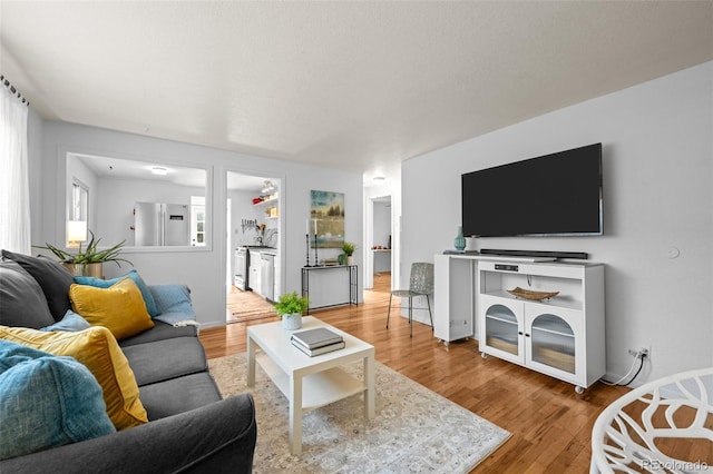 5465 Saulsbury Ct, Arvada, CO 80002 - living area featuring wood finished floors