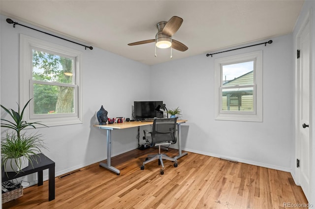 5465 Saulsbury Ct, Arvada, CO 80002 - office space with healthy amount of natural light, light wood-style floors, and ceiling fan