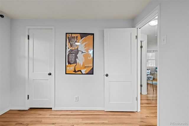 5465 Saulsbury Ct, Arvada, CO 80002 - unfurnished bedroom featuring light wood finished floors and baseboards