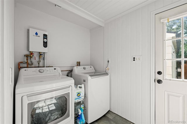 5465 Saulsbury Ct, Arvada, CO 80002 - laundry area featuring washing machine and dryer and tankless water heater