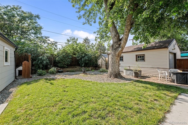 5465 Saulsbury Ct, Arvada, CO 80002 - view of yard with an outdoor structure and an outdoor fire pit