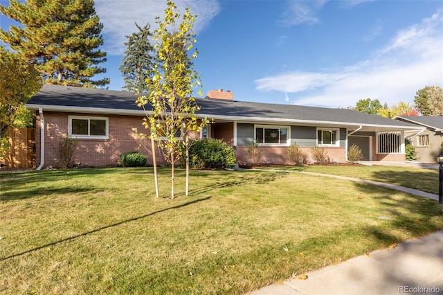 ranch-style house with a front yard