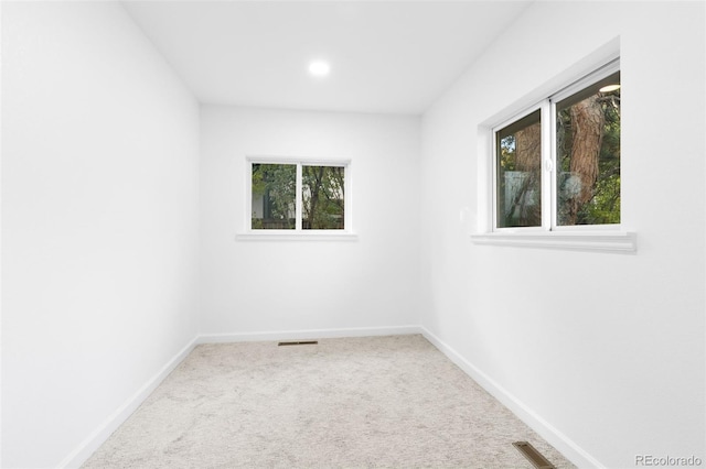 view of carpeted spare room